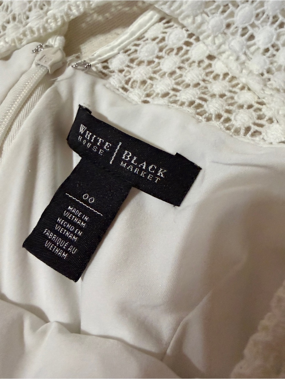 Like new White House Black Market sleeveless shift dress in white crochet lace. - Picture 7 of 8